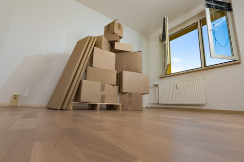 Packed office boxes and workstations prepared for transport
