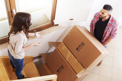 Van being packed carefully with household items for transport