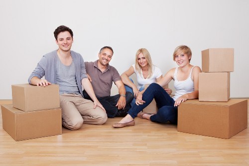 Careful loading of boxes and household items into a van
