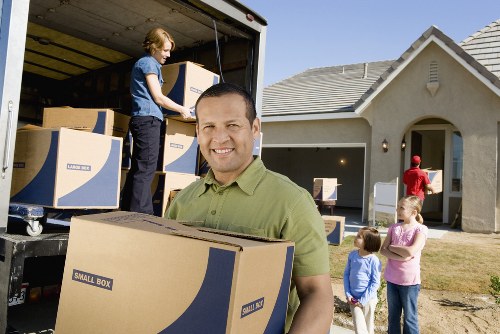 Professional movers transporting boxes and furniture locally in Whitton